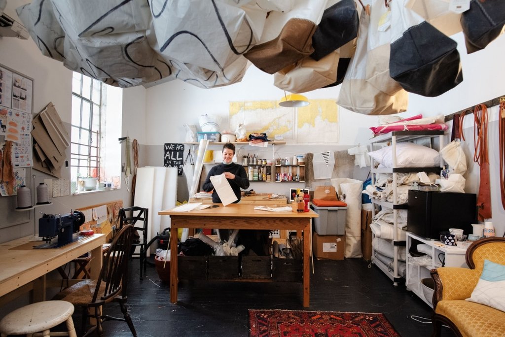 Korina Brewer makes eco friendly bags from recycled sails, waxed canvas and natural leather.